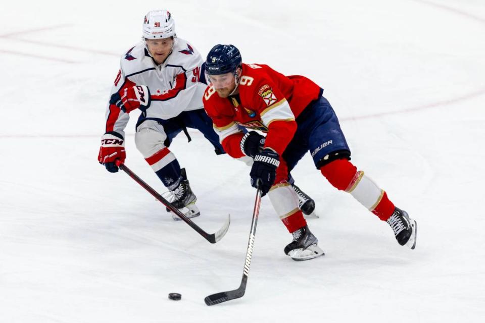 Florida Panthers center Sam Bennett (9) fights for possesion of the puck with Washington Capitals center Joe Snively (91) during the third period of an NHL game at FLA Live Arena in Sunrise, Florida, on Tuesday, November 15, 2022.
