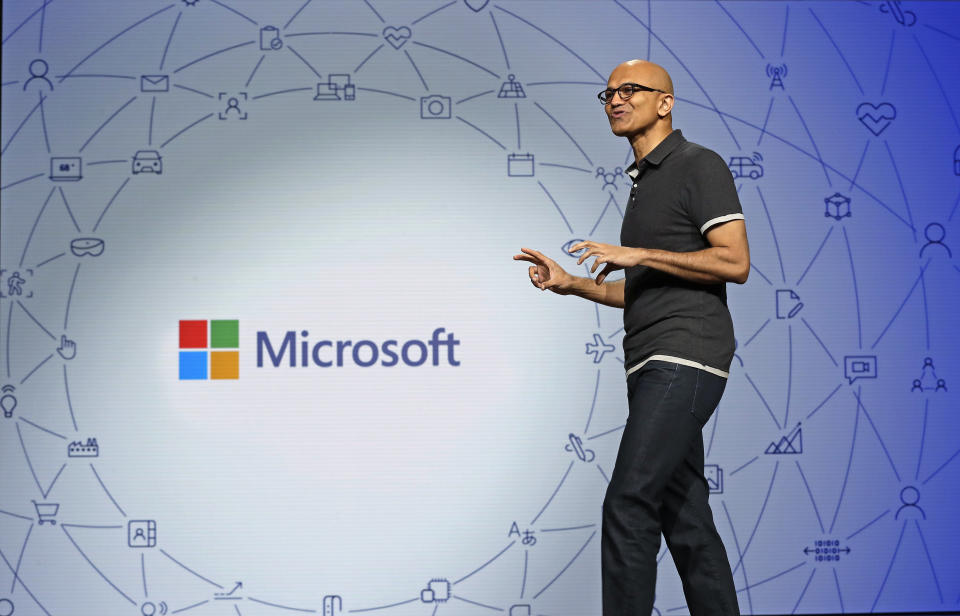 FILE- In this May 7, 2018, file photo Microsoft CEO Satya Nadella delivers the keynote address at Build, the company's annual conference for software developers in Seattle. Microsoft Corp. reports earnings Wednesday, Oct. 24. (AP Photo/Elaine Thompson, File)