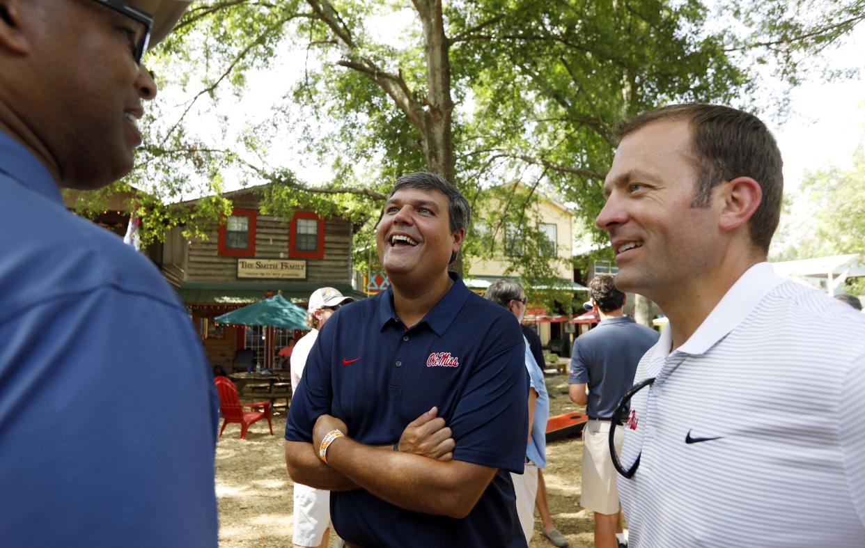 Ross Bjork (R) is Texas A&M's new athletic director.