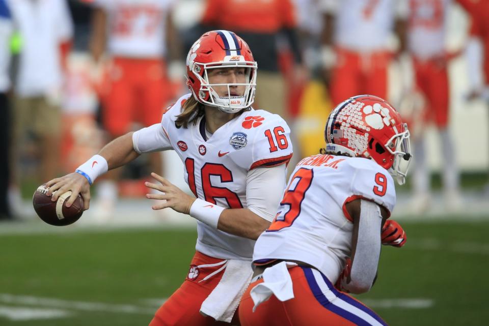 Clemson quarterback Trevor Lawrence looks for a receiver.