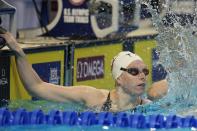 Lilly King reacts after winning the Women's 100 Breaststroke during wave 2 of the U.S. Olympic Swim Trials on Monday, June 14, 2021, in Omaha, Neb. (AP Photo/Jeff Roberson)