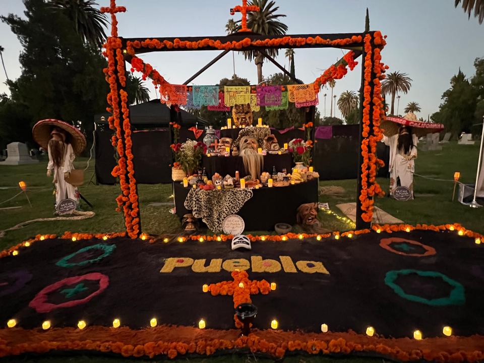 An altar honoring the dead is displayed at the Día de Los Muertos celebration at the Hollywood Forever Cemetery in Los Angeles on Saturday, Oct. 28, 2023.