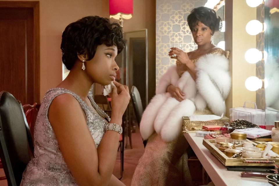 Jennifer Hudson prepares in her dressing room while Mary J. Blige looks on