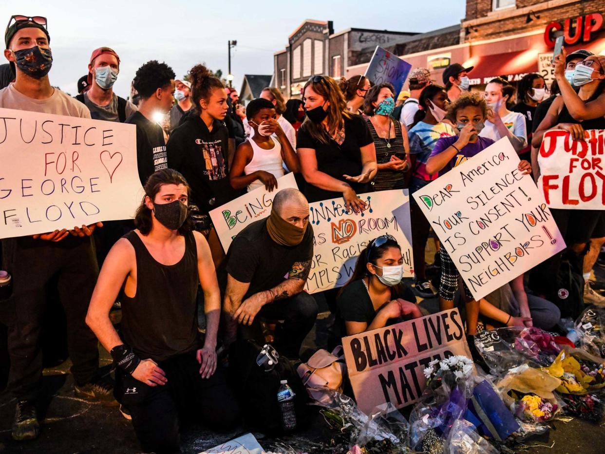 Protesters gather near the makeshift memorial in honour of George Floyd marking one week anniversary of his death, on 1 June 2020 in Minneapolis, Minnesota: Chandan Khanna/AFP via Getty Images