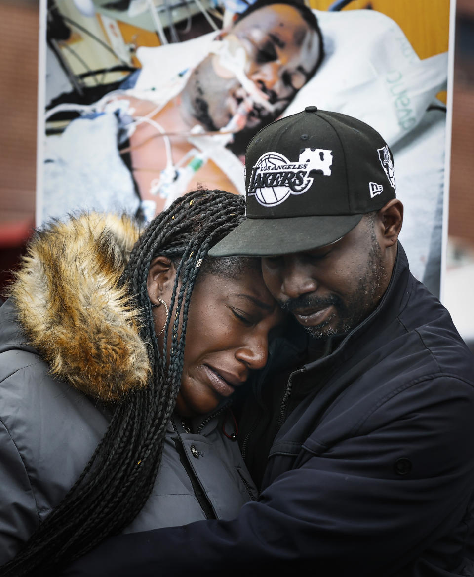 FILE - Kenyana Dixon is comforted during a rally for her brother Tyre Nichols at the National Civil Rights Museum on Jan. 16, 2023. Nichols was killed during a traffic stop with Memphis Police on Jan. 7. Memphis was a city on edge Monday, Jan. 23, 2023 amid anticipation of the release of video footage of a Black man's violent arrest and subsequent death that has led to three separate law enforcement investigations and the firings of five police officers. (Mark Weber/Daily Memphian via AP, file)