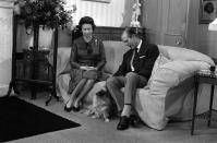 Queen Elizabeth II and the Duke of Edinburgh during their traditional summer break at Balmoral Castle. The royal couple are seen with 'Tinker', a cross between a corgi and long haired dachshund. (Photo by PA Images via Getty Images)