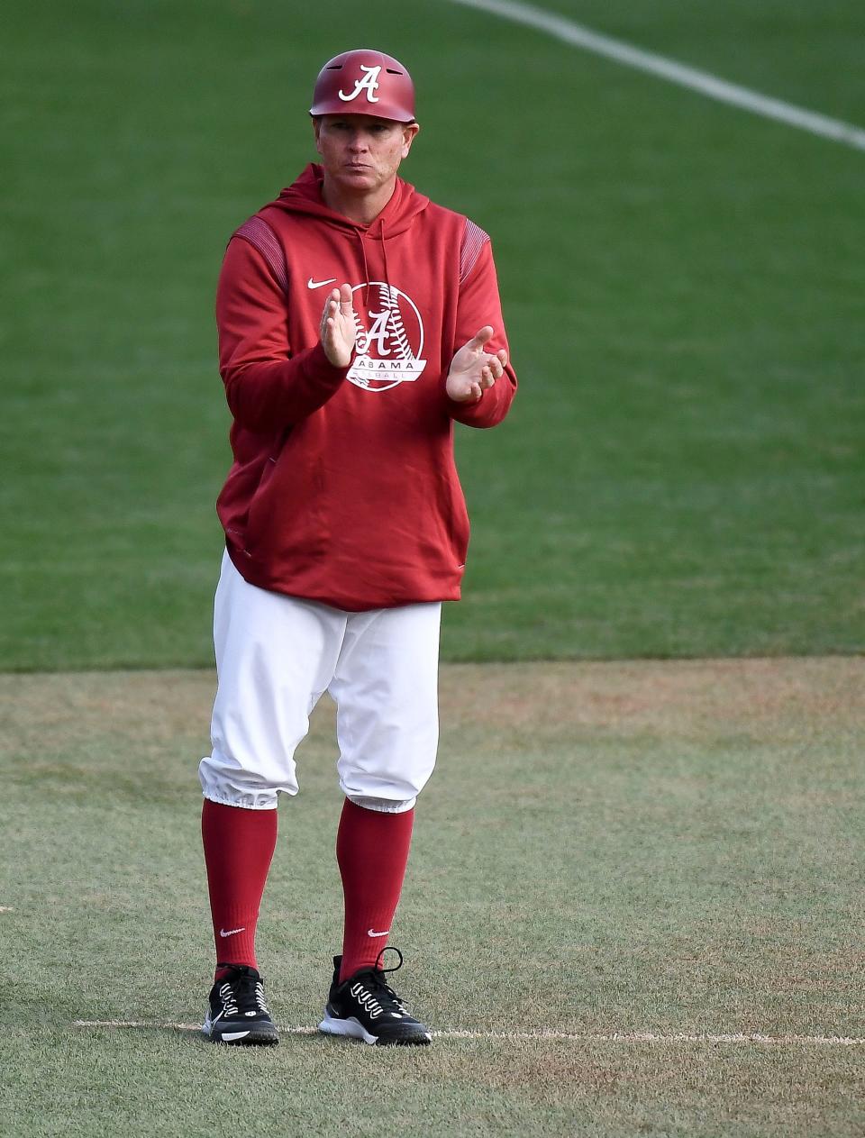 Alabama baseball opened the season with a series with Xavier Friday, Feb. 18, 2022, at Sewell-Thomas Stadium in Tuscaloosa. Head Coach Brad Bohannon claps as his team comes to bat. 