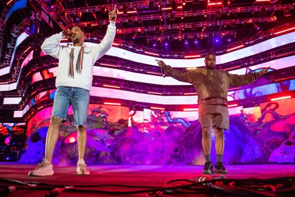 Kid Cudi and Kanye West | Timothy Norris/Getty Images