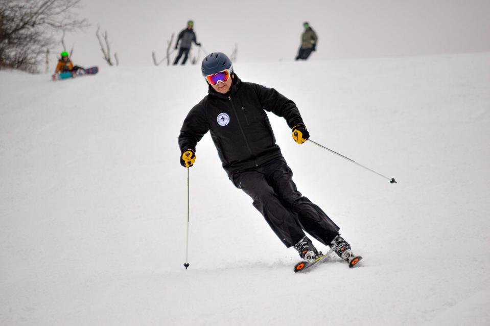 A skier goes down one of the 11 runs at Seven Oaks recreation area in Boone, Iowa.