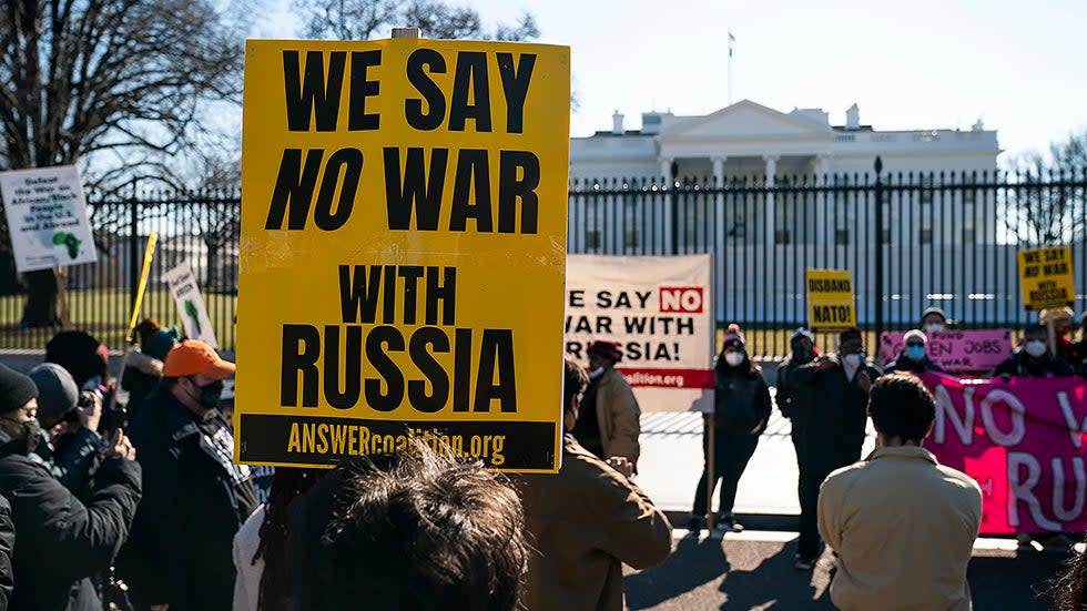 Protesters from multiple groups gather outside the White House to rally against any potential war in Russia with Ukraine on Thursday, January 27, 2022.