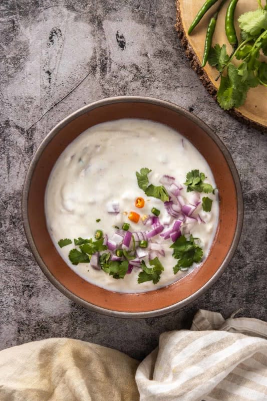 <p>Urban Farmie</p><p>A basic Indian yogurt sauce that is simple, fresh, and versatile.</p><p><strong>Get the recipe: </strong><a href="https://urbanfarmie.com/indian-raita/" rel="nofollow noopener" target="_blank" data-ylk="slk:Easy Homemade Raita;elm:context_link;itc:0;sec:content-canvas" class="link "><strong>Easy Homemade Raita</strong></a></p>