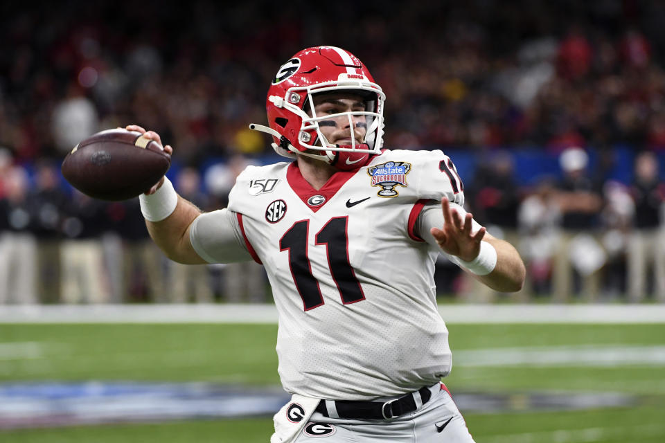 Georgia quarterback Jake Fromm (11) was drafted by the Bills in the fifth round, likely lower than he expected to go. (AP Photo/Bill Feig)