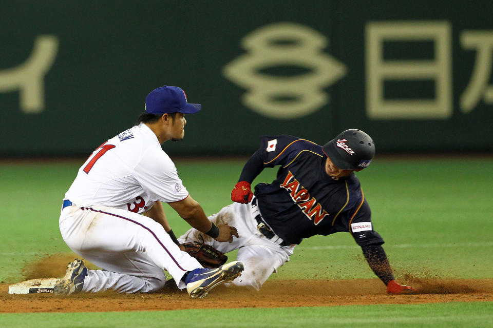 TOKYO, JAPAN - MARCH 08: Infielder Takashi Toritani #1 of Japan steals a base in the top half of the tenth inning during the World Baseball Classic Second Round Pool 1 game between Japan and Chinese Taipei at Tokyo Dome on March 8, 2013 in Tokyo, Japan.  (Photo by Koji Watanabe/Getty Images)