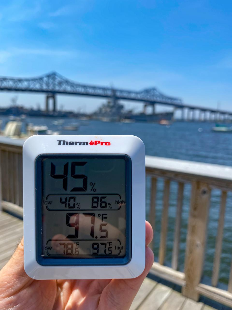 At the waterfront in Fall River, the air temperature reads 97.5 degrees.