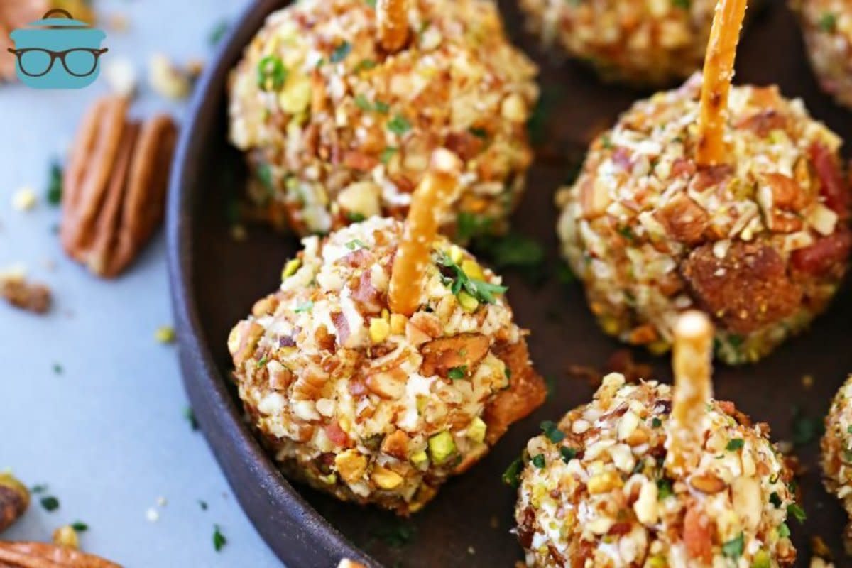 <p>The Country Cook</p><p>These tiny bites are as delicious as they are adorable.</p><p><strong>Get the recipe: <a href="https://www.thecountrycook.net/easy-mini-cheeseballs-appetizer-recipe/" rel="nofollow noopener" target="_blank" data-ylk="slk:Mini Cheese Balls;elm:context_link;itc:0;sec:content-canvas" class="link rapid-noclick-resp">Mini Cheese Balls</a></strong></p>