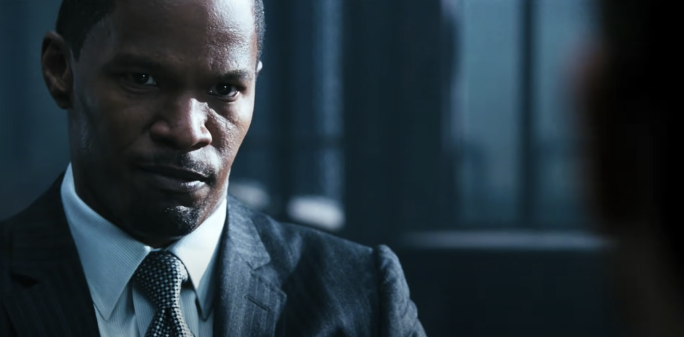 Jamie Foxx listens intently