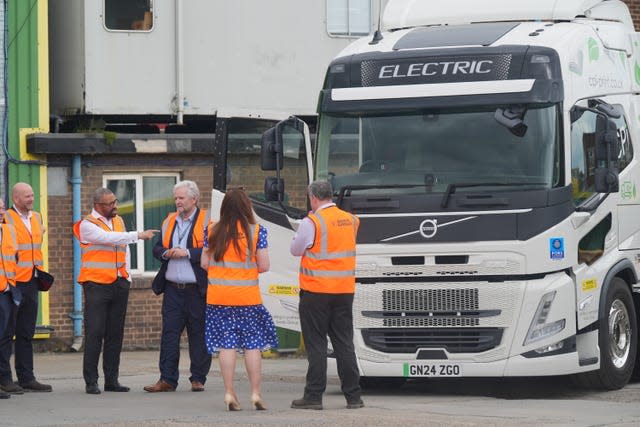 Home Secretary James Cleverly dons a hi-vis vest as he arrives for a visit to Swain Group in Rochester, Kent 