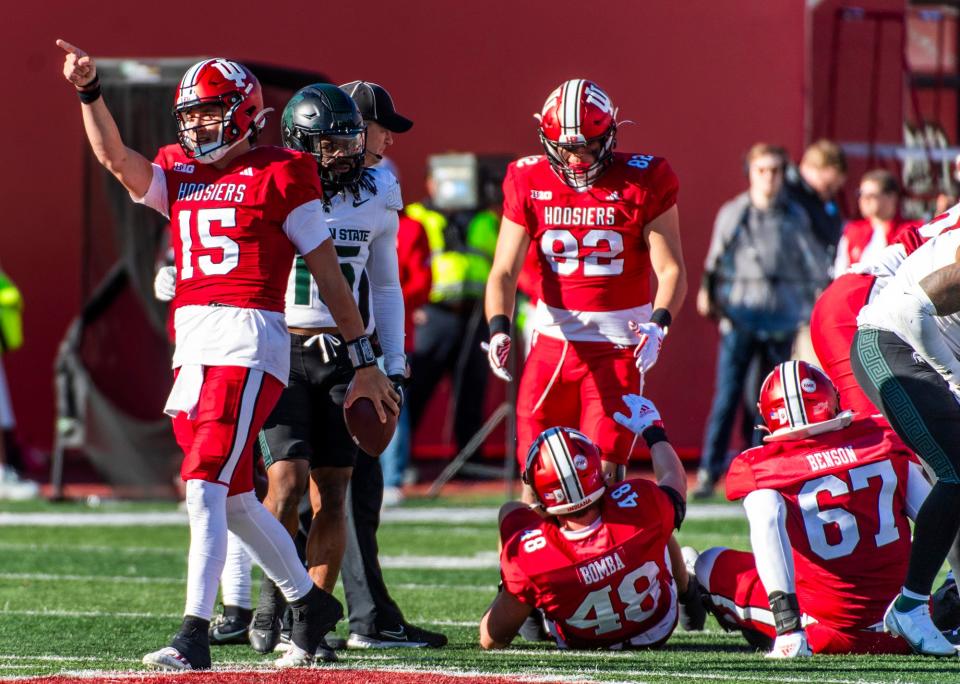 Indiana's Brendan Sorsby (15) celebrates his first down on a fourth down run during the second half of the Indiana versus Michigan State football game at Memorial Stadium on Saturday, Nov. 18. Sorsby entered the transfer portal and committed to Cincinnati Dec. 5.