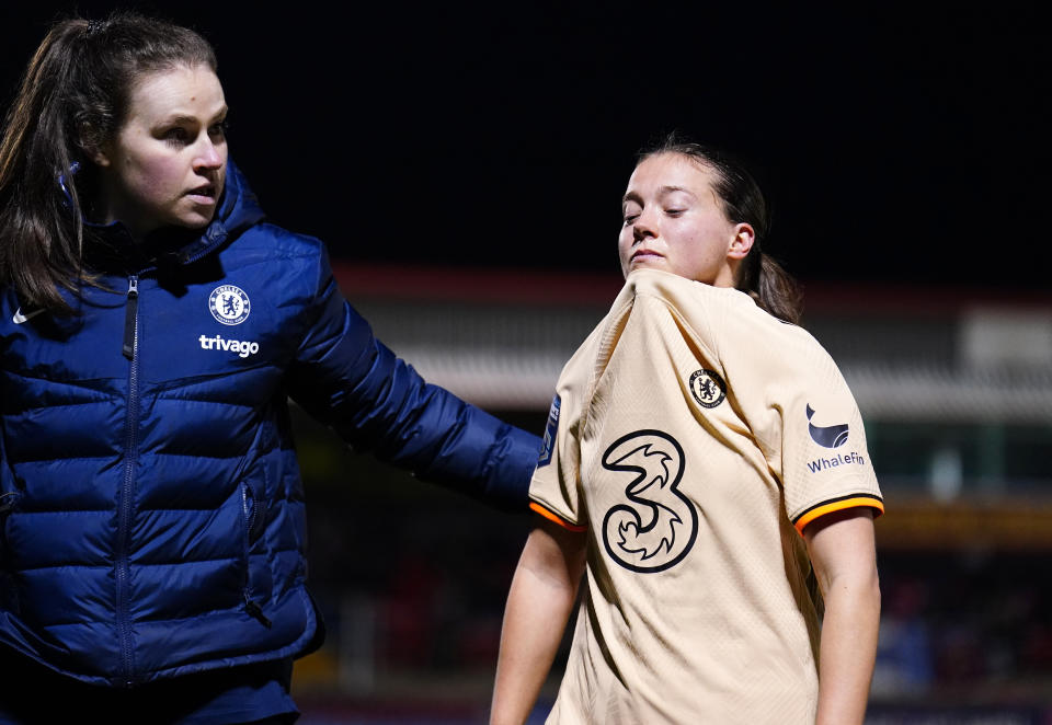 Fran Kirby leaves the field after picking up an injury.