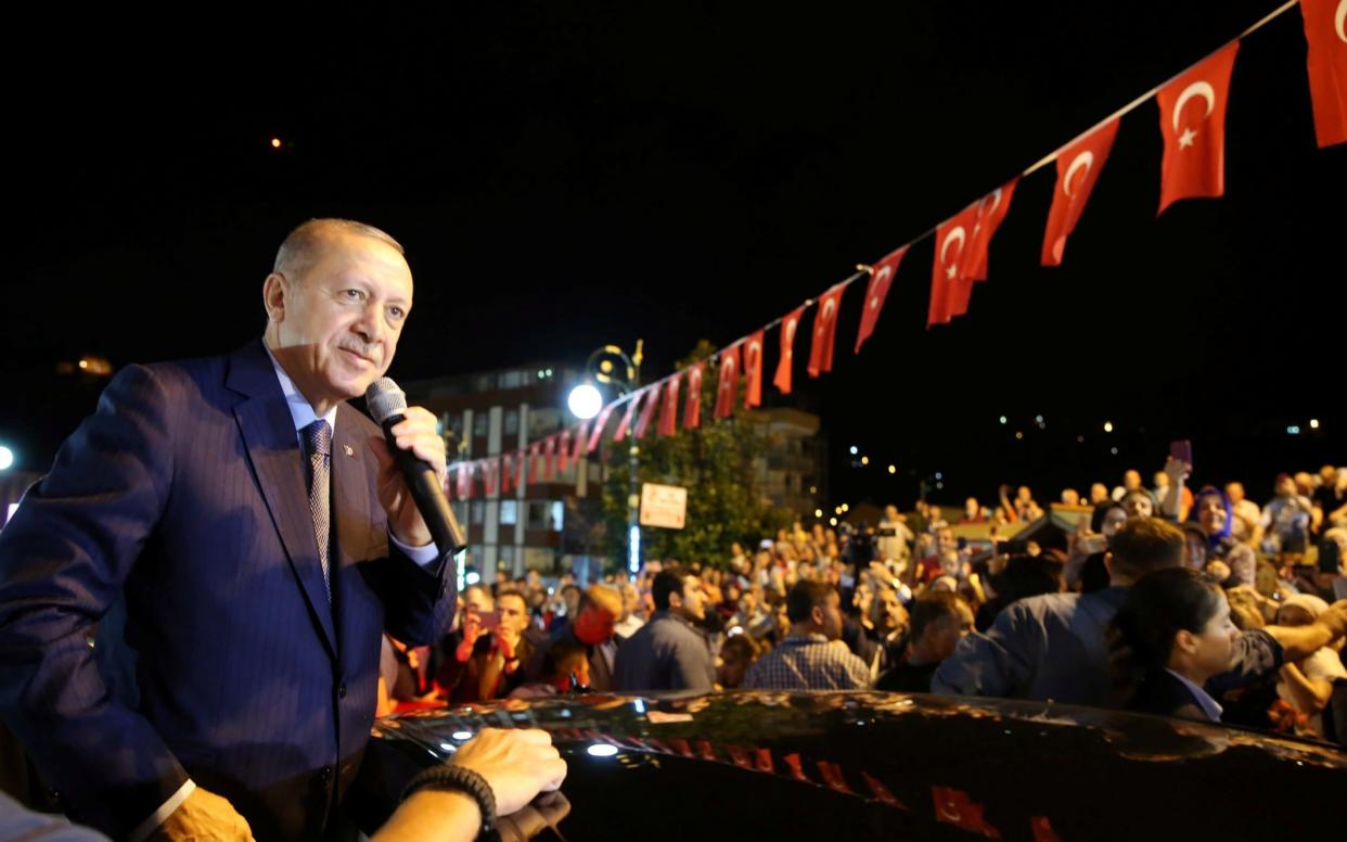 Turkish President Tayyip Erdogan has told Turks not to worry about the nosedive in the value of their country's currency, saying: 'If they have their dollars, we have our people, our God' - REUTERS