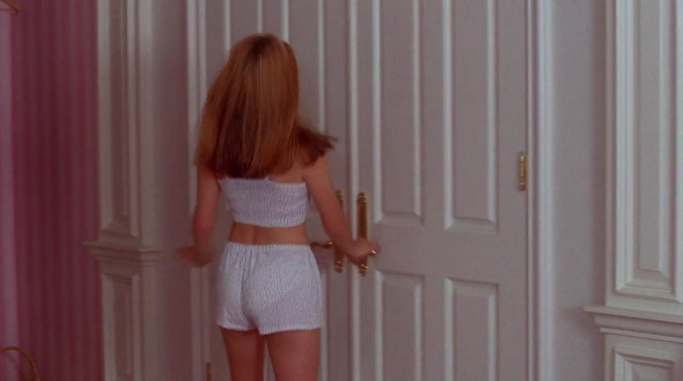 Cher wearing matching crop top and short pajamas