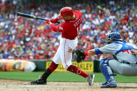 Jun 24, 2018; Cincinnati, OH, USA; Cincinnati Reds first baseman Joey Votto (19) doubles against the Chicago Cubs in the seventh inning at Great American Ball Park. Mandatory Credit: Aaron Doster-USA TODAY Sports