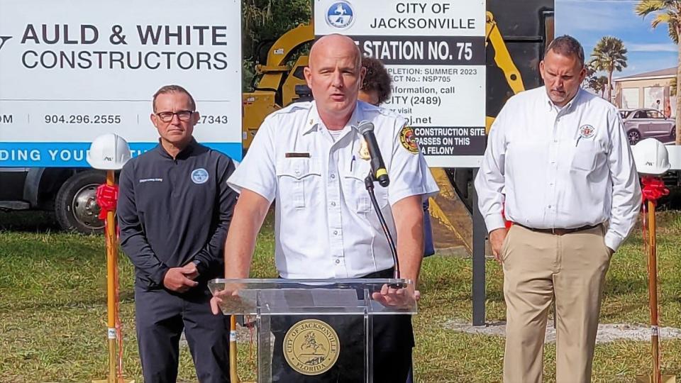 Jacksonville Fire Chief Keith Powers (center) speaks about the need for Fire Station 75 at 2630 Firestone Road before its Wednesday groundbreaking. He is joined by Mayor Lenny Curry (left) and fire union chief Randy Wyse.