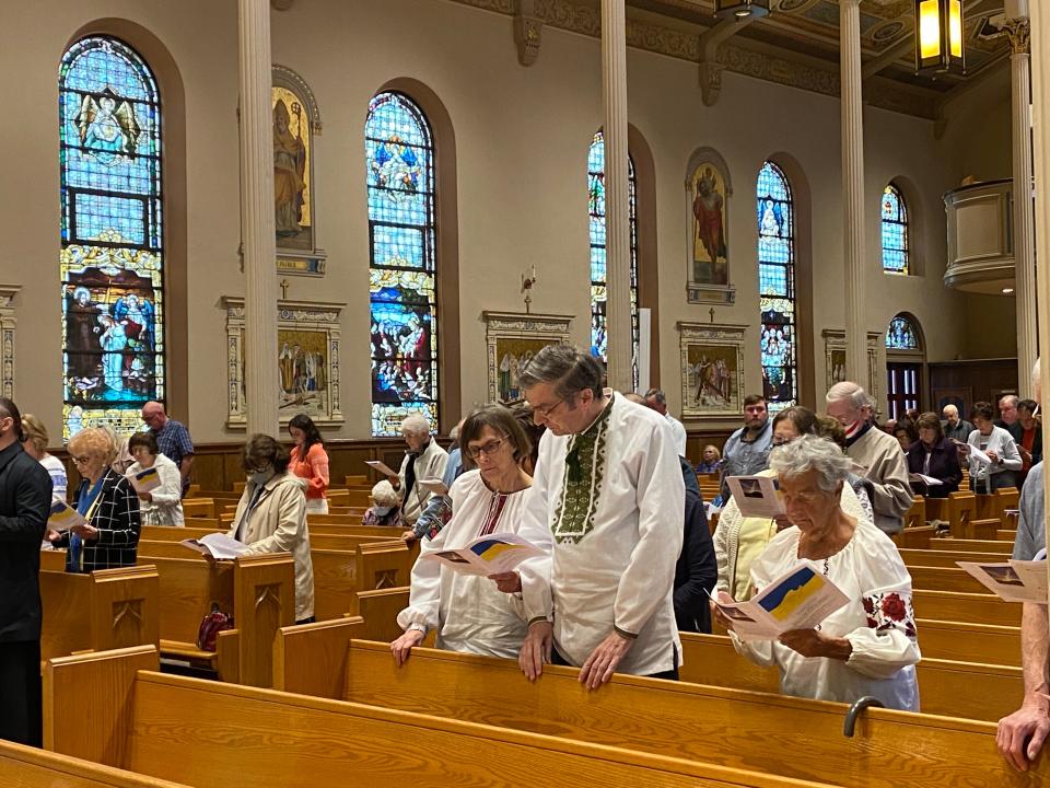 Many individuals attended the prayer service for an end to the war in Ukraine at the Cathedral of Saint Peter in traditional Ukrainian garb.