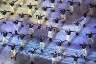 <p>Artists perform during the closing ceremony. REUTERS/Christian Hartmann </p>