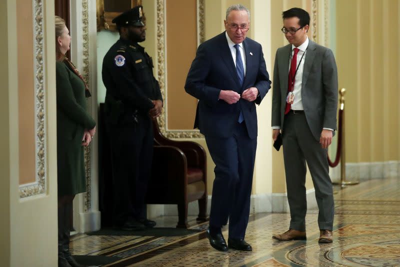 U.S. Senate Minority Leader Schumer departs the Senate floor after his remarks, in the U.S. Capitol in Washington