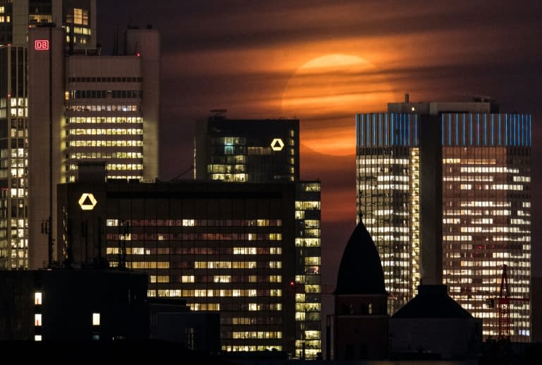 The 'supermoon' is covered by clouds behind the skyline of Frankfurt am Main, Germany, on November 14, 2016