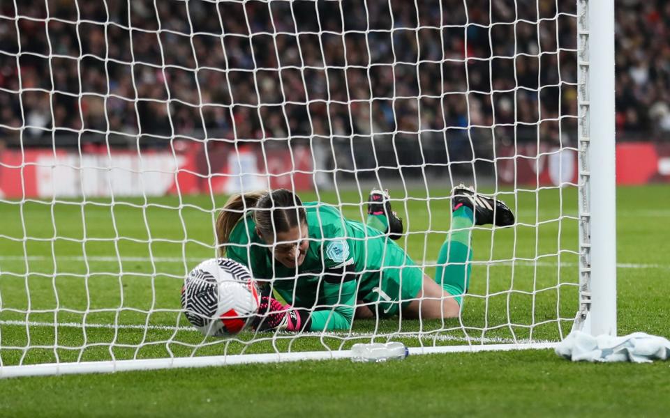 England goalkeeper Mary Earps reacts after making a mistake that led to Holland's second goal.