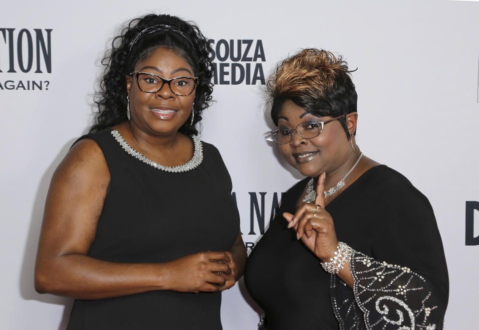 FILE - Lynnette Hardaway, left, and Rochelle Richardson, a.k.a. Diamond and Silk, arrive at the LA Premiere of "Death of a Nation" at the Regal Cinemas at L.A. Live on July 31, 2018, in Los Angeles. Hardaway, known by the moniker “Diamond” of the conservative political commentary duo "Diamond and Silk", has died, former President Donald Trump and the pair's official Twitter account announced Monday, Jan. 9, 2023. She was 51. (Photo by Willy Sanjuan/Invision/AP, File)