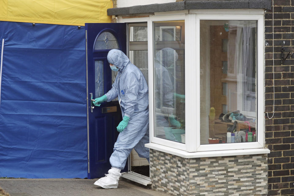 <p>A forensic officer leaves a house in Freemens Way, in connection with missing woman Sarah Everard, in Deal, England, Wednesday March 10, 2021. Britain's Metropolitan police says an officer has been arrested in connection with the case of a woman who went missing in London last week. The force said the fact that the man is a serving police officer is “shocking and deeply disturbing.” Police said the officer was arrested late Tuesday in Kent, southeast of London, as part of the investigation into the disappearance of Sarah Everard. (Steve Parsons/PA via AP)</p>
