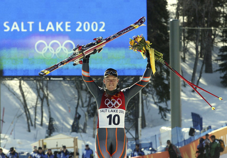 FILE - In this Feb. 10, 2002, file photo, Austria's Fritz Strobl celebrates during the flower ceremony after winning the gold medal in the Salt Lake City Winter Olympic Games Men's Downhill in Snowbasin, Utah. Salt Lake City got the green light to bid for an upcoming Winter Olympics most likely for 2030 in an attempt to bring the Games back to the city that hosted in 2002 and provided the backdrop for the U.S. winter team's ascendance into an international powerhouse. (AP Photo/Rudi Blaha, File )