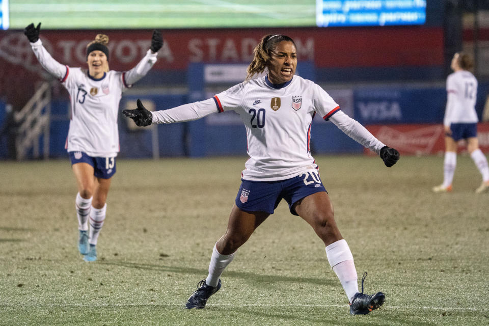 FILE - United States forward Catarina Macario (20) and midfielder Ashley Sanchez (13) celebrate Macario's goal during the first half of a She Believes Cup soccer match against Iceland at Toyota Stadium, Wednesday, Feb. 23, 2022 in Frisco, Texas. (AP Photo/Jeffrey McWhorter, File)