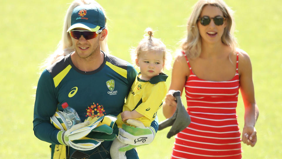 Tim Paine, pictured here with daughter Milla and wife Bonnie at the MCG in 2018.