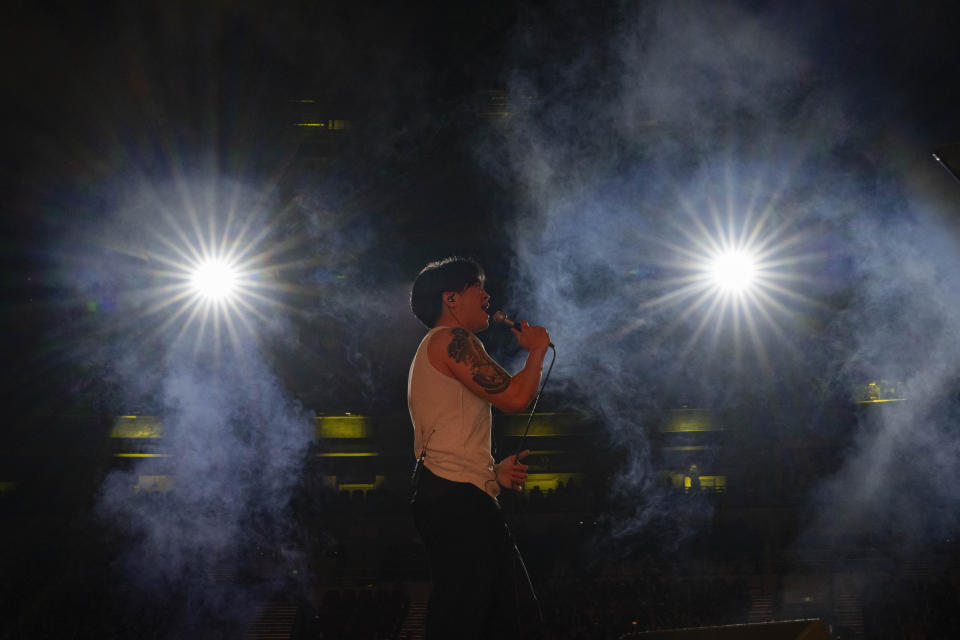 Chinese rapper Shixin Wenyue performs at a concert in Chengdu in southwestern China's Sichuan province, Saturday, March 16, 2024. China's rap industry is flourishing, after a pause in 2018 that left many wondering if it'd be banned by the country's powerful censors. By staying clear of the government's red lines, the genre's explosive growth is able to continue. (AP Photo/Ng Han Guan)