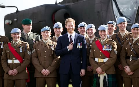 Prince Harry with the Army Air Corps graduates - Credit:  Heathcliff O'Malley