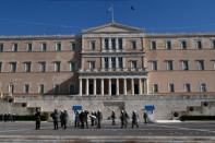 Greece secures deal to unlock 12 bn euros bailout funds