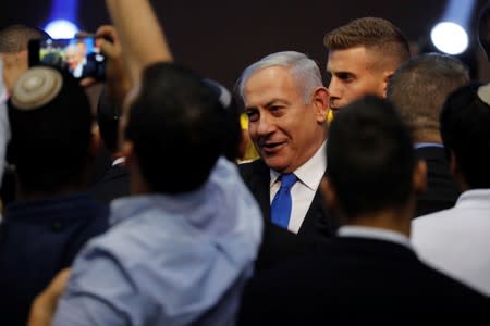 Israeli Prime Minister Benjamin Netanyahu arrives at the Likud party headquarters in Tel Aviv