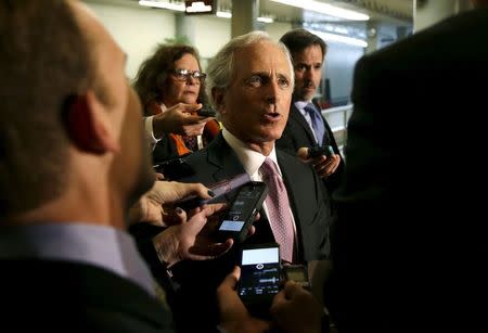Senate Foreign Relations Committee Chairman Senator Bob Corker (R-TN) (C) talks to reporters before meeting with Secretary of State John Kerry (not pictured) on nuclear negotiations with Iran on Capitol Hill in Washington, in this April 14, 2015 file photo. REUTERS/Gary Cameron