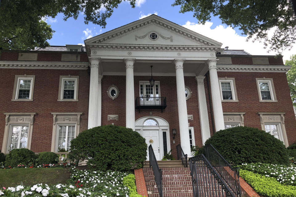 This photo shows the West Virginia governor’s mansion on Wednesday, Aug. 21, 2019, in Charleston, W.Va. A persistent lawsuit is drawing on the state constitution in an effort to force Republican Gov. Jim Justice to live at the governor’s mansion. Democratic Del. Isaac Sponaugle filed the case and accuses Justice of violating a passage in the state Constitution that says the governor “shall reside at the seat of government.” The result has been a long legal back and forth centered on the definition of the word reside. A judge requested more documents from both sides after a brief court hearing Wednesday. (AP Photo/Anthony Izaguirre)