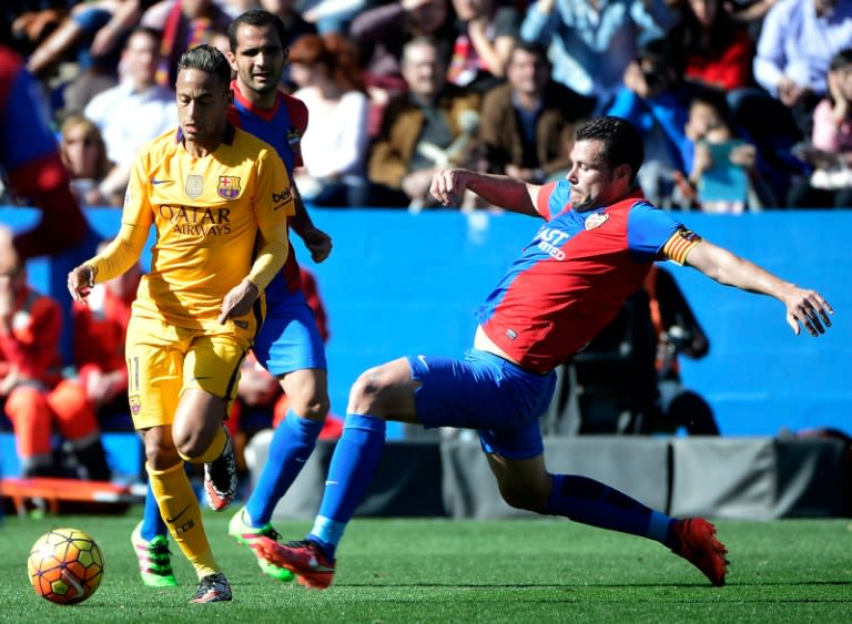 Levante's David Navarro (right) scored an own goal against Barcelona at the Ciutat de Valencia stadium on February 7, 2016