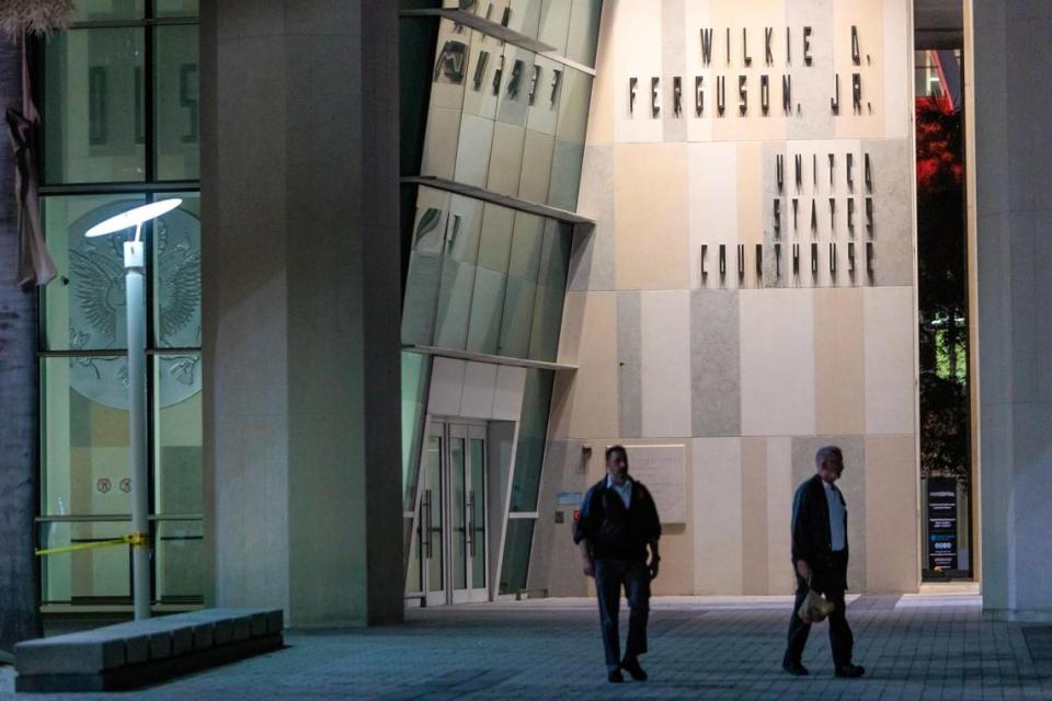 Federal agents walk by the entrance to the Wilkie D. Ferguson Jr. U.S. Courthouse, Tuesday, June 13, 2023, in Miami. Former President Donald Trump is making a federal court appearance on dozens of felony charges accusing him of illegally hoarding classified documents.