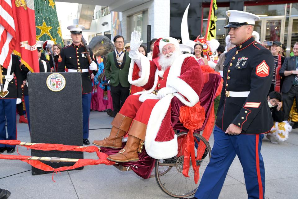 A person dressed as Santa Claus attends a press conference for the 90th Anniversary Hollywood Christmas Parade at Hollywood & Highland on November 21, 2022 in Hollywood, California.