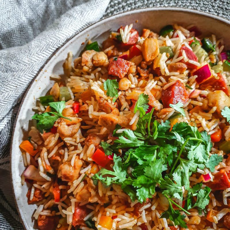 <p>Cooking with Bry</p><p>If you’re looking for a cheerful, colorful and delicious rice bowl filled with protein and flavor, this chicken and chorizo rice bowl recipe is for you.</p><p><strong>Get the recipe: <a href="https://cookingwithbry.com/chicken-and-chorizo-rice-bowl-recipe/" rel="nofollow noopener" target="_blank" data-ylk="slk:Chicken and Chorizo Rice Bowl;elm:context_link;itc:0;sec:content-canvas" class="link rapid-noclick-resp">Chicken and Chorizo Rice Bowl</a></strong></p>