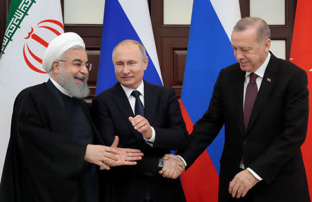 Iranian President Hassan Rouhani, Russian President Vladimir Putin and Turkish President Recep Tayyip Erdogan meet in the Black sea resort of Sochi, Russia, 14 February 2019. Sergei Chirikov/Pool via REUTERS