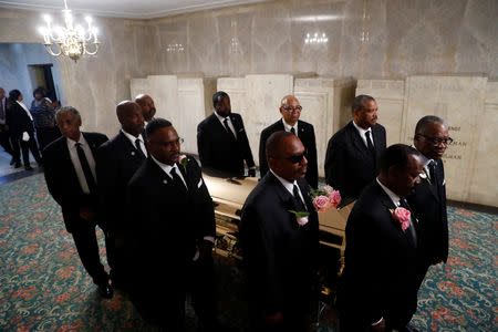 The casket of the late singer Aretha Franklin is laid to rest at her burial at Woodlawn Cemetery in Detroit, Michigan, U.S. August 31, 2018. Paul Sancya/Pool via REUTERS