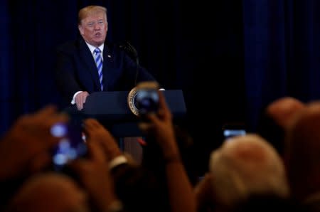 FILE PHOTO: U.S. President Donald Trump delivers remarks during a meeting with supporters in Utica, New York, U.S., August 13, 2018. REUTERS/Carlos Barria